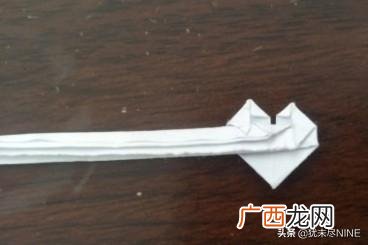 怎么做手工戒指,简单的手工折纸戒指,用钱折纸爱心戒指步骤图解?
