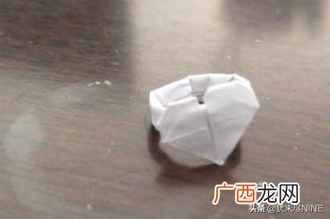怎么做手工戒指,简单的手工折纸戒指,用钱折纸爱心戒指步骤图解?