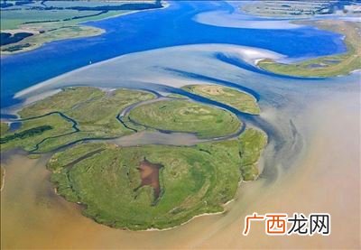 沙坝是怎么形成的,长江使泻湖的形成？