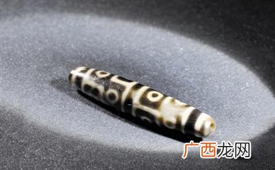 天珠到底是什么,天珠牙黄料和纯白料区别？