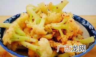 菜花、胡萝卜、蒜、精盐、味精、白糖、海鲜酱油、芝麻油、辣椒油 凉拌菜花的做法